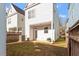 A view of the backyard with a small patio and stepping stones to the lawn at 4511 All Points View Way, Raleigh, NC 27614