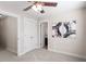 Bedroom with neutral carpet, ceiling fan and closet at 4511 All Points View Way, Raleigh, NC 27614