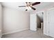 Bedroom with ceiling fan, neutral carpet and open doorway at 4511 All Points View Way, Raleigh, NC 27614
