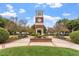 Community clock tower surrounded by benches and manicured landscaping on a sunny day at 4511 All Points View Way, Raleigh, NC 27614