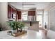 Cozy dining area featuring a round table near the kitchen with stainless steel appliances and granite counters at 4511 All Points View Way, Raleigh, NC 27614