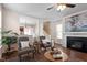 Open-concept living area with fireplace and seamless flow to adjacent spaces at 4511 All Points View Way, Raleigh, NC 27614