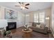 Inviting living room with a fireplace, hardwood floors, and neutral tones at 4511 All Points View Way, Raleigh, NC 27614
