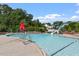 A view of the community pool with a slide, a lifeguard stand, and lounge chairs at 4511 All Points View Way, Raleigh, NC 27614