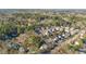 An aerial view of a neighborhood with many trees interspersed throughout at 5302 Silkwood Dr, Durham, NC 27713