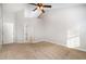 A sunlit bedroom features vaulted ceiling, fan, two windows, and light-colored walls at 5302 Silkwood Dr, Durham, NC 27713