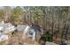 An aerial view highlighting the home's private wooded lot at 577 Woodbury, Pittsboro, NC 27312