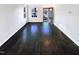 Well-lit entryway featuring hardwood floors and a front door at 6025 Herston Rd, Raleigh, NC 27610
