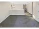 Open hallway with carpet floors and modern chandelier at 6025 Herston Rd, Raleigh, NC 27610