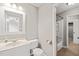 Cozy bathroom featuring a vanity, toilet, and a shower with tub at 621 Bashford Rd, Raleigh, NC 27606