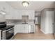 Well-equipped kitchen with stainless steel appliances and ample cabinet space, perfect for culinary enthusiasts at 621 Bashford Rd, Raleigh, NC 27606