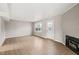 Spacious living room with natural light and a convenient door, offering a comfortable setting at 621 Bashford Rd, Raleigh, NC 27606