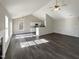 Bright, airy living room with high ceilings and kitchen view at 70 Waterford Dr, Angier, NC 27501