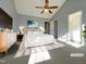 Tranquil main bedroom with soft gray walls and an ensuite bathroom entrance at 70 Waterford Dr, Angier, NC 27501