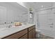 Bathroom features a double sink vanity, framed mirrors, tile floors and a tub and shower combo at 729 Colby Pl, Durham, NC 27713