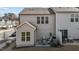 Rear exterior view of a home with a patio and well-maintained landscaping at 729 Colby Pl, Durham, NC 27713
