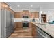 Well-equipped kitchen featuring stainless steel appliances, granite countertops, and ample cabinet space at 729 Colby Pl, Durham, NC 27713