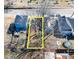 An aerial view of the property lot shows a defined parcel among other neighborhood homes at 822 Kent St, Durham, NC 27701