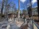 View of a backyard deck perfect for entertaining, overlooking a tranquil scene of trees at , Raleigh, NC 27613