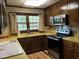 Kitchen featuring wood cabinets, stainless steel appliances, countertops and a sink at , Raleigh, NC 27613