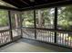Covered porch area with views of mature trees and a water view at , Raleigh, NC 27613