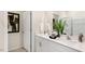 Bright bathroom with double vanity, granite countertops, and framed mirrors at 921 Canis Minor Rd, Wendell, NC 27591