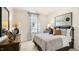 Bedroom with carpeted floor, soft lighting, and neutral décor at 921 Canis Minor Rd, Wendell, NC 27591