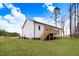 Home with a nice backyard featuring a wooden deck and lush lawn at 9230 Bear Run Ln, Middlesex, NC 27557