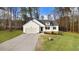 Lovely exterior view of a charming home featuring a well-kept lawn and a private driveway at 9230 Bear Run Ln, Middlesex, NC 27557