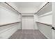 Large walk-in closet with shelving and ample space at 9230 Bear Run Ln, Middlesex, NC 27557