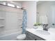This bright bathroom has a shower/tub combo, a light gray vanity, and a large mirror at 00 Cedar Grove Church Rd Rd, Roxboro, NC 27574