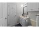 Bathroom featuring a vanity with storage at 131 Carriage House Trl, Garner, NC 27529
