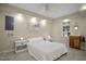 Bedroom featuring tiled floors, neutral walls, and a ceiling fan at 1402 Princess Anne Rd, Cary, NC 27513