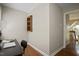 Home office featuring hardwood floors and a built-in bookshelf on the wall at 1402 Princess Anne Rd, Cary, NC 27513