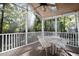 Charming screened porch perfect for enjoying the outdoors with wooded views at 1402 Princess Anne Rd, Cary, NC 27513