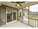 Relaxing screened porch with a ceiling fan and sliding glass doors leading inside at 1758 Daiquiri Turn, Sanford, NC 27332