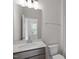 Bathroom with large vanity, quartz countertop, toilet, and tile floors at 231 Frosted Iris Lane Ln # 174, Garner, NC 27529