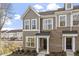 Charming townhome featuring brick and vertical siding and large windows at 231 Frosted Iris Lane Ln # 174, Garner, NC 27529