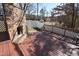 Spacious backyard deck with a brick fireplace, perfect for outdoor entertaining at 2701 Erinridge Road Rd, Raleigh, NC 27610