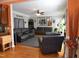 Spacious living room featuring hardwood floors, neutral walls, modern furnishings, and an open layout at 2701 Erinridge Road Rd, Raleigh, NC 27610