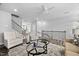 Bright living room showcasing hardwood floors and an open floor plan at 2959 Sunflower Rd, Apex, NC 27502