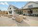Community patio with comfortable seating and outdoor fireplace, ideal for relaxing at 2959 Sunflower Rd, Apex, NC 27502