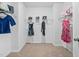 Walk-in closet with ample shelving and space for storage at 2959 Sunflower Rd, Apex, NC 27502