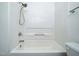 Clean bathroom featuring a shower and tub combo with white tile surround at 3 Shepherd Ln # Bldg C, Chapel Hill, NC 27514
