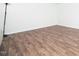 Bright bedroom featuring new wood-look flooring and fresh white walls at 3 Shepherd Ln # Bldg C, Chapel Hill, NC 27514
