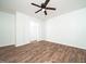 Bedroom with a ceiling fan, closet, and modern flooring at 3 Shepherd Ln # Bldg C, Chapel Hill, NC 27514