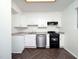 Charming kitchen with granite countertops, stainless steel appliances, and ample cabinet space at 3 Shepherd Ln # Bldg C, Chapel Hill, NC 27514