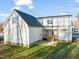 Aerial view of the backyard showing the house and the covered patio at 304 Ashley Woods Ct, Clayton, NC 27527