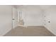 Neutral carpeted bedroom with view to hallway between the storage closets at 304 Ashley Woods Ct, Clayton, NC 27527