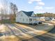 Charming home with a lovely porch, situated on a spacious, well-maintained lot at 304 Ashley Woods Ct, Clayton, NC 27527
